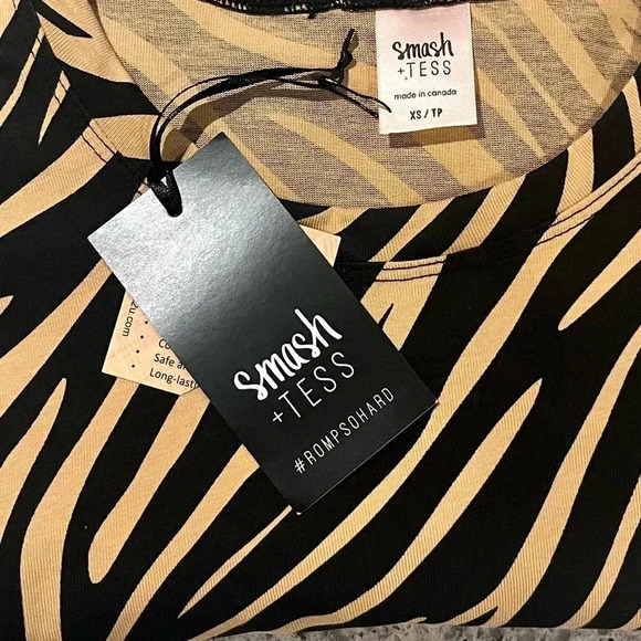 Smash + Tess The T-Shirt Bodysuit
Lexi Leopard - Picture 7 of 7